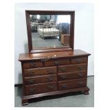 Seven Drawer Cherry 52" Dresser with mirror, on