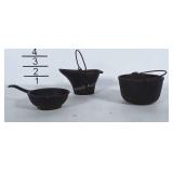 Miniature cast iron pieces.