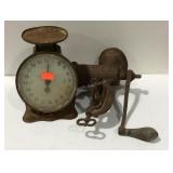 Scale and a food grinder-chopper