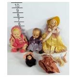 Lot of old dolls. One is needs repair.