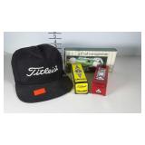 Golf supplies, Titleist hat, sleeve of NXT and DT