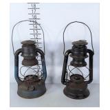 2 older lanterns without glass globes. Both are