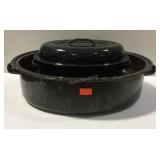 Two black and white enamel pans with lids