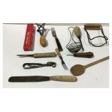 Kitchenware utensils with potato masher, wine