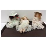 Three porcelain dolls