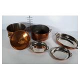 Copper tone cookware with brass handles in nice