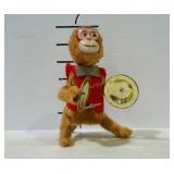 Wind up monkey toy, made in Japan. Does work.