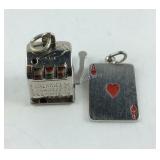 Two Sterling gambling charms