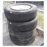 Set of four good year wrangler tires, on five lug