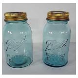 2 quart ball jars with glass insert lids.