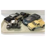 Five toy car models