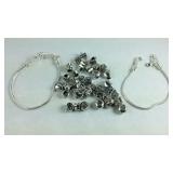 Two charm bracelets with charms 7.5in silvertone
