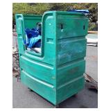 Green Poly Trux container on wheels. Filled with