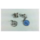 Four Sterling silver charms