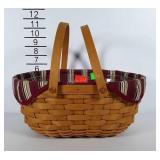 Oval shaped Longaberger basket with handles, poly