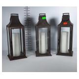 3 hanging or sitting candle lanterns. Metal and