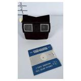 View-master with 1 reel. Reel has pictures of