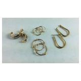 Four pairs of earrings one is gold over Sterling