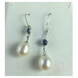 Pair of dangle earrings