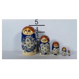Set of 5 Russian nesting dolls. Tallest is just