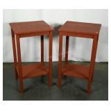 Two painted stands with undershelves.