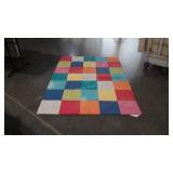 Area Rug. Multi color block pattern, 48x66", used