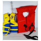 Child size Scooby-Doo water life vest and another