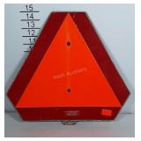 Caution triangle on galvanized metal.