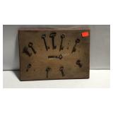 Wall hanging Key decor is missing a few keys