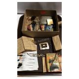 Trinket lot with pins, hair clips, eye glasses,