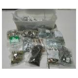 Small plastic bin of assorted nails, bolts and