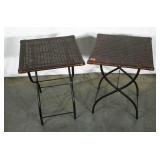 Two folding patio end stands. Both show some wear.