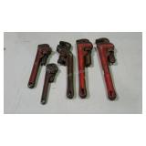 Five RIDGID pipe wrenches in assorted sizes.