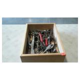Wood box full of assorted pliers and snips, etc.