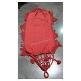 Hammock, fringed rust colored fabric