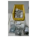 Stackable bin full of bags of bolts and screws in