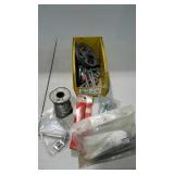 Stackable bin full of assorted hardware.