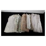 Crochet, tatted and pompom style coverlet, table