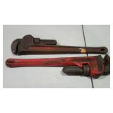 Two RIDGID 18" pipe wrenches.