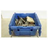 Small hardware bin filled with assorted drill