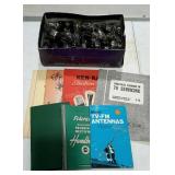 Radio and TV manuals and shoebox full of radio