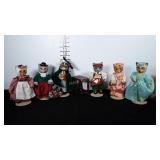 Cat dolls with stands. All have porcelain heads