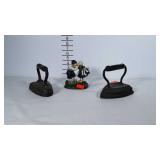 Cast iron lot: 2 flat irons and kissing boy and