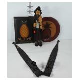 Cast iron hinge candle sconces, carved wooden