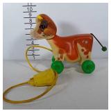 1972 Fisher-Price cow pull toy.
