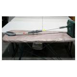 Ironing board and Shark sweeper.