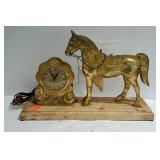 UNITED, self starting clock with horse statue.