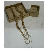 Costume jewelry. Multi strand necklace and ring.