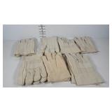 Seven pair canvas and felted work gloves