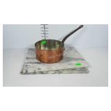 Marble pastry boards and a copper pan made in